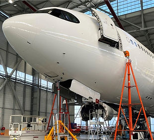 Commercial aircraft in maintenance hangar
